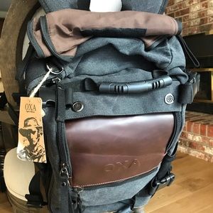 Brand New Back Pack with versatility to brief case
